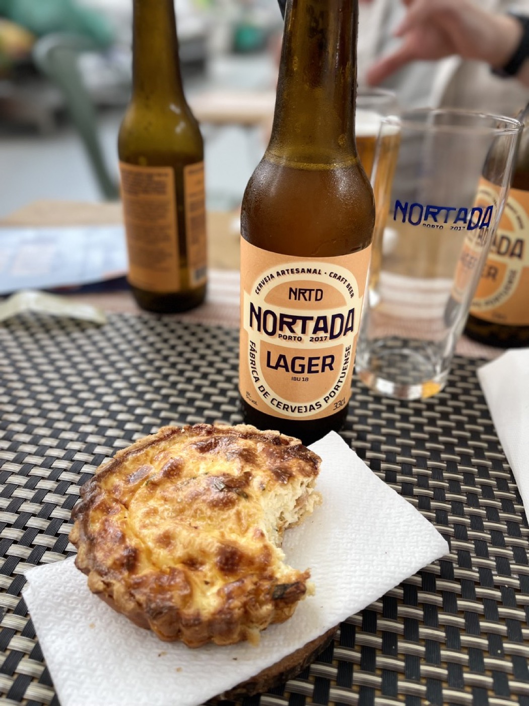 A Nortada beer next to a single croquette